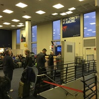Photo taken at Gate C66 by Sam S. on 2/8/2016
