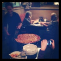 Photo taken at Piesanos Stone Fired Pizza by Jordan F. on 10/13/2012