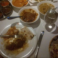 Photo taken at The Raja Fine Indian Cuisine by kerry g. on 10/19/2013