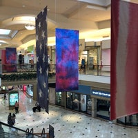 Photo taken at The Mall at Wellington Green by J C. on 7/6/2019