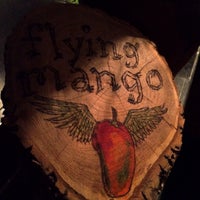 Photo taken at Flying Mango by Erik R. on 3/9/2015
