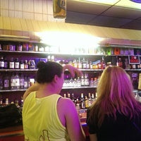 Photo taken at Ola&#39;s Liquors by kristina on 7/13/2014