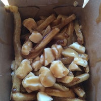 Photo taken at The Big Cheese Poutinerie by Scott B. on 6/28/2014