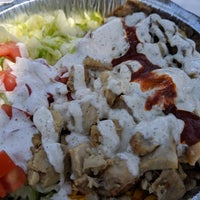 Photo taken at The Halal Guys by J L. on 8/2/2019