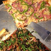 Photo taken at New York Pizza Kitchen by Lani on 12/19/2012