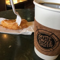 Photo taken at Mystic Coffee Roaster by Yuskie M. on 12/3/2016