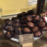 Photo taken at Laughing Moon Chocolates by Chris D. on 10/3/2016