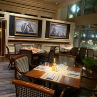 Photo taken at Rowes Wharf Sea Grille by Simon Λ. on 3/8/2023