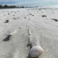 Photo taken at Coquina Beach by Kelly K. on 1/13/2024