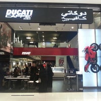 Photo taken at Ducati Caffe by Eren K. on 10/23/2012