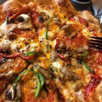 Photo taken at Pie Five Pizza by Jessica W. on 5/23/2015