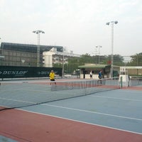 Photo taken at Tennis Court by Ginola O. on 12/30/2013