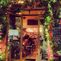 Photo taken at Malagana Café &amp;amp; Bar by Diana O. on 2/13/2014