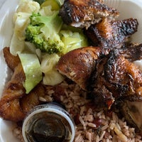 Photo taken at The Jerk Spot Jamaican Restaurant by Tiffany H. on 6/8/2020