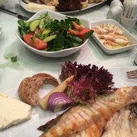 Photo taken at Kalispera Restaurant by Deniz B. on 8/4/2015
