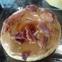 Photo taken at Glazed Doughnuts &amp;amp; Cafe by Kathi J. on 10/4/2012