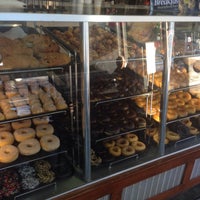 Photo taken at Winchell&amp;#39;s Donuts by Justin O. on 12/8/2014