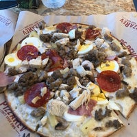 Photo taken at PizzaRev by Isaarr79 on 3/15/2018