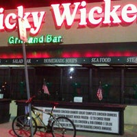 Photo taken at Sticky Wicket Bar and Grill by Miss J. on 10/25/2012