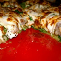Photo taken at Minsky&#39;s Pizza by Tracey H. on 12/31/2012