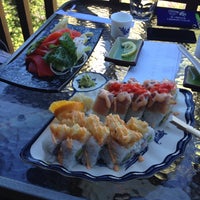 Photo taken at Tough City Sushi by Melissa C. on 7/13/2014