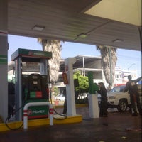Photo taken at Pemex by Tania P. on 2/2/2013