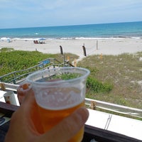 Photo taken at Sand On The Beach Bar And Grill by Rick V. on 6/22/2022