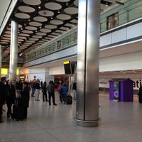 Photo taken at T5 Arrivals Hall by Marshall M. on 4/23/2013
