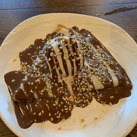 Photo taken at Indulge Dessert Lounge by Fedora M. on 11/10/2019