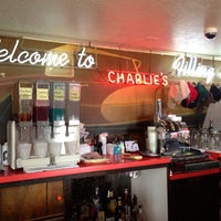 Photo taken at Charlie&amp;#39;s Filling Station Lounge by Katie G. on 8/11/2013