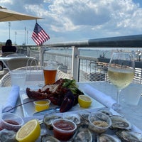 Photo taken at River Dock Cafe by Anna A. on 7/4/2020