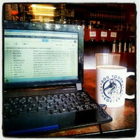Photo taken at Dog Tooth Coffee Co by Damian B. on 6/12/2012