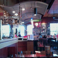 Photo taken at Red Robin Gourmet Burgers and Brews by Jennifer H. on 10/14/2011