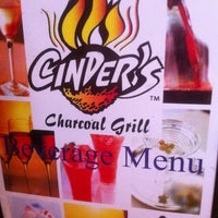 Снимок сделан в Cinder&amp;#39;s Charcoal Grill пользователем Steph V. 12/3/2011