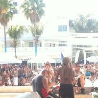 Photo taken at The Pool Parties at The Surfcomber by Caitlin M. on 3/27/2011