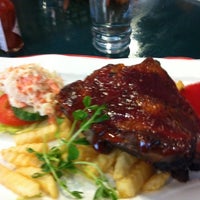 Photo taken at The Vines Seafood &amp; Steak Restaurant by Bernard C. on 10/29/2011