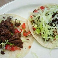 Photo taken at Tamales Industry by AJ H. on 4/24/2012