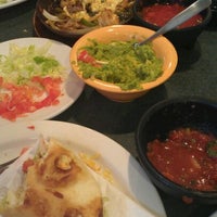 Photo taken at tijuana&amp;#39;s mexican kitchen by Christa L. on 5/19/2012