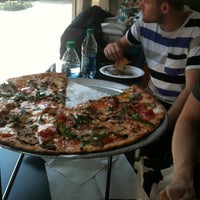 Photo taken at Upper Crust Pizzeria by Kristian E. on 7/4/2012