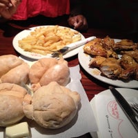 Photo taken at Nando&amp;#39;s by Blessing M. on 11/26/2011