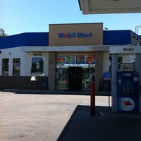 Photo taken at Mobil by Amy A. on 8/5/2011