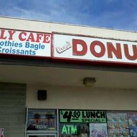 Photo taken at Lilly Cafe Donuts by William K. on 10/14/2011