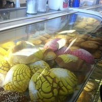 Photo taken at El Carrusel Bakery by Carmen B. on 2/14/2012