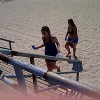 Photo taken at Beach 54/boardwalk by Sam Z. on 7/2/2012