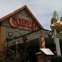 Photo taken at Cody&amp;#39;s Original Roadhouse by Eric C. on 6/23/2012