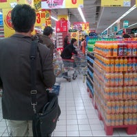 Photo taken at Carrefour by Ricky T. on 3/22/2013