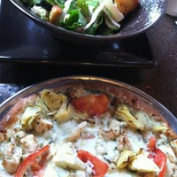 Foto tomada en Palio&amp;#39;s Pizza Cafe  por Amanda B. el 10/23/2012