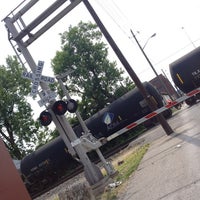 Photo taken at Michigan Street Railroad Crossing by Ben R. on 6/21/2013