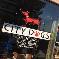 Photo taken at City Dogs Grocery by Ben R. on 11/29/2014