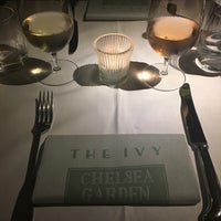 Photo taken at The Ivy Chelsea Garden by Omur T. on 7/19/2018